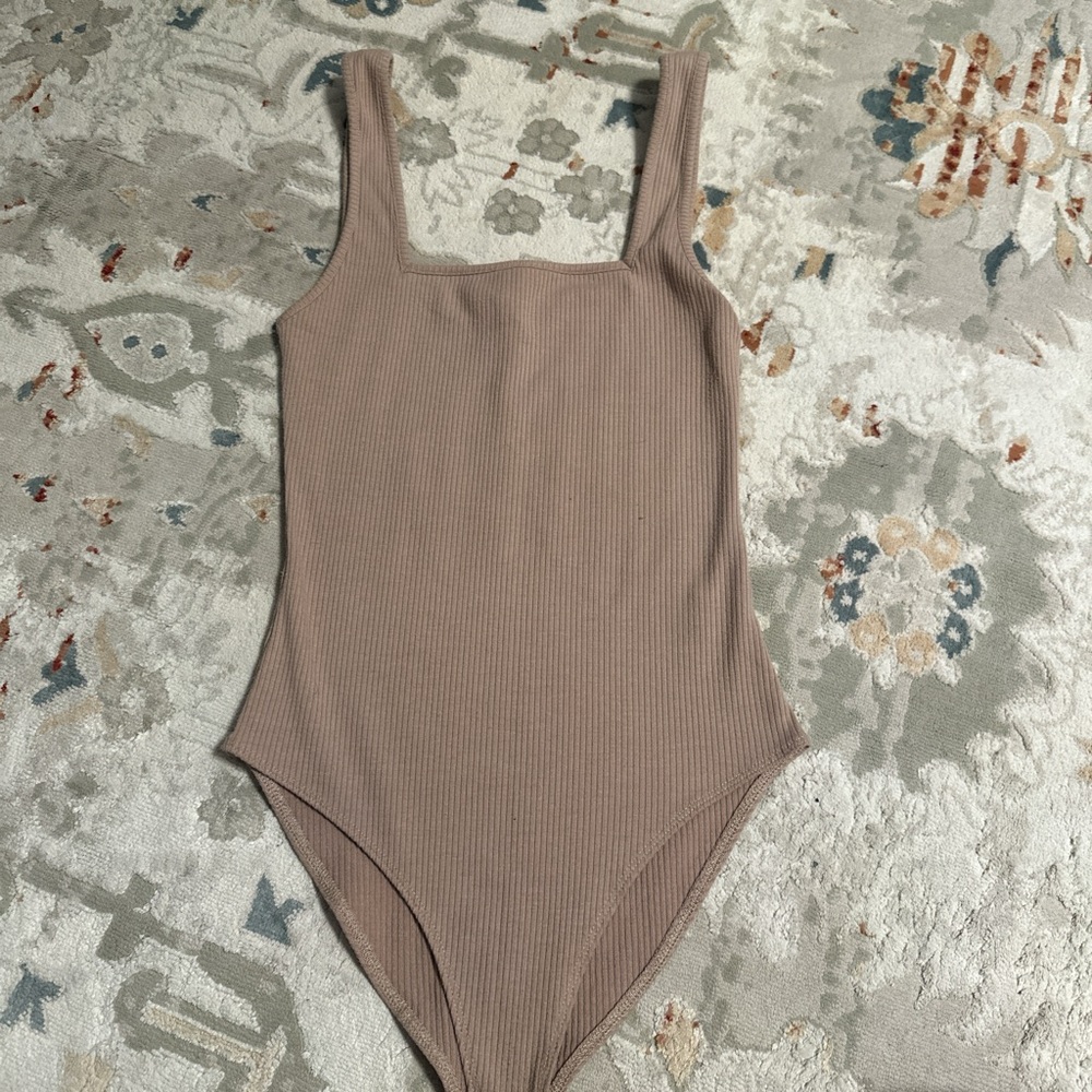 Tan body suit